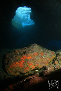 Lots of current inside a cave. Waves on top!, fantastic t... by Natasha Maksymenko 